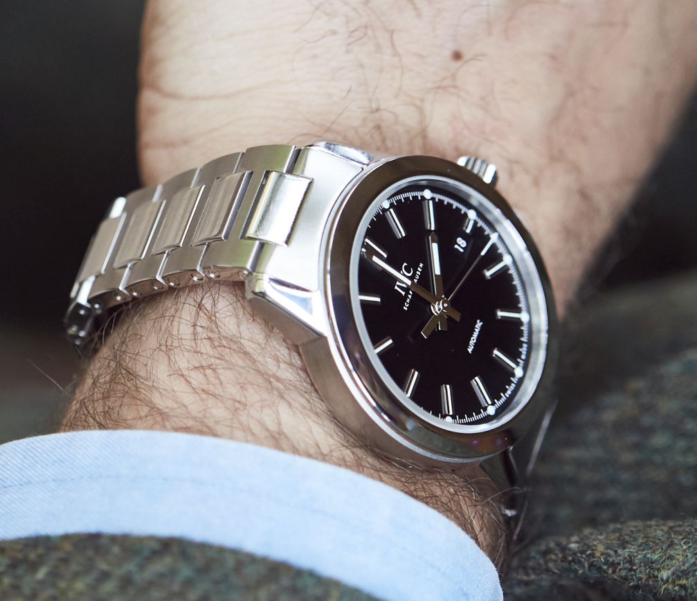 The stainless steel copy watches have black dials.